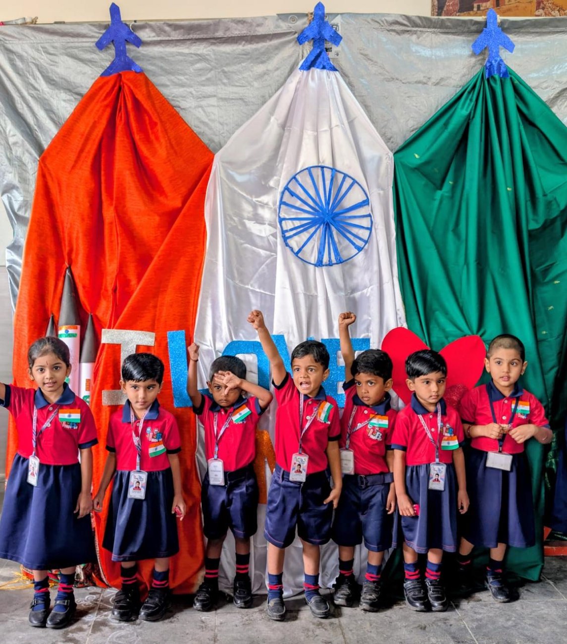 Little Flower School young students celebrating Independence Day with the national flag